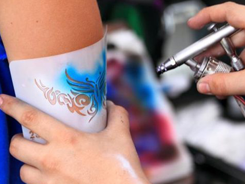 Air brush tattoo activity by BounceParkSG