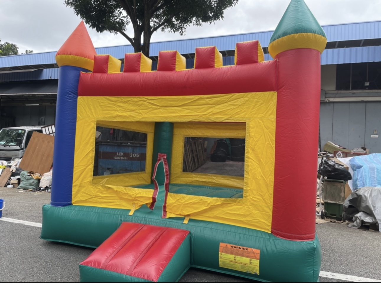 Colourful classic bouncy castle by BounceParkSG
