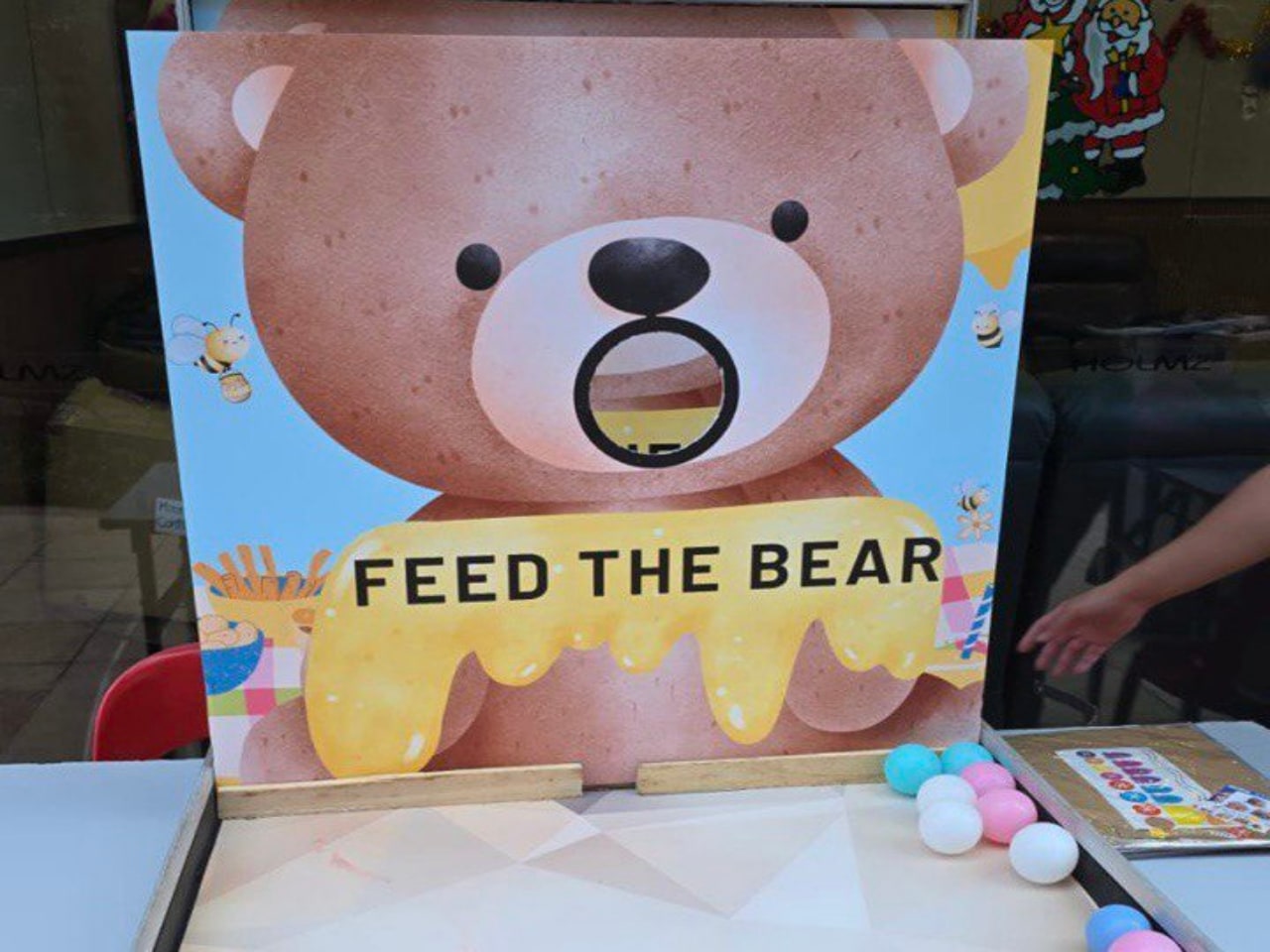 Feed the Bear carnival game by BounceParkSG