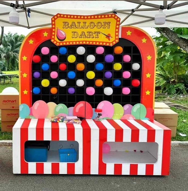 Large balloon dart wall by BounceParkSG